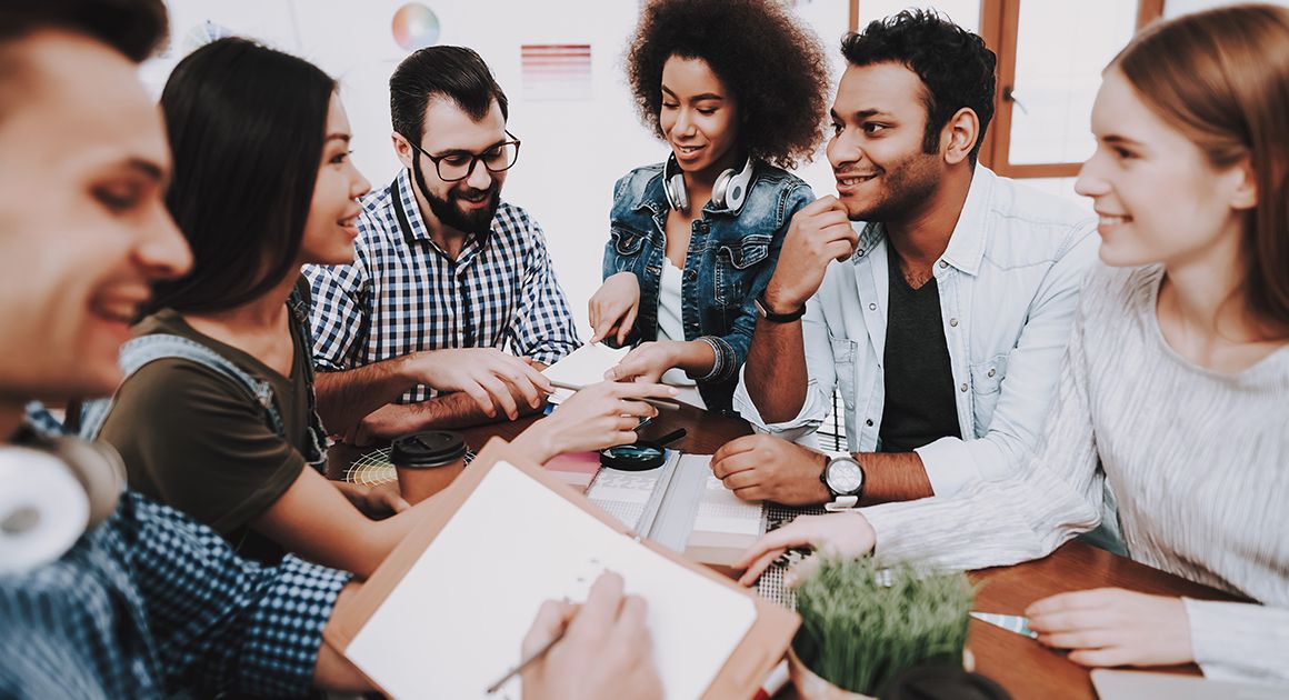 Diverse group of people collaborating on a project
