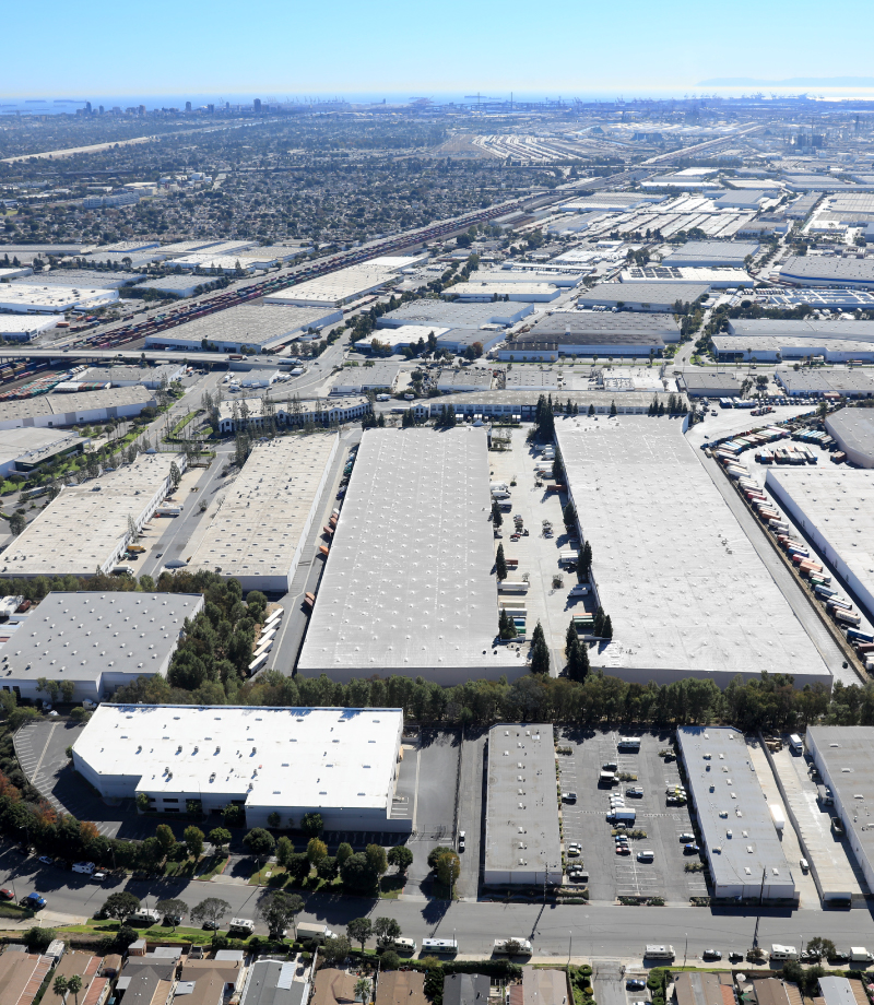 Aerial photograph of large industrial warehouses in South Bay of Los Angeles