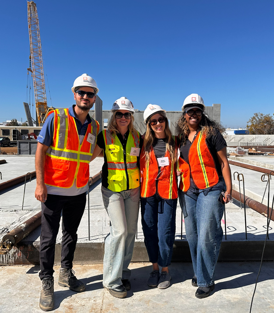 Group of Rexford employees at an outdoor construction site