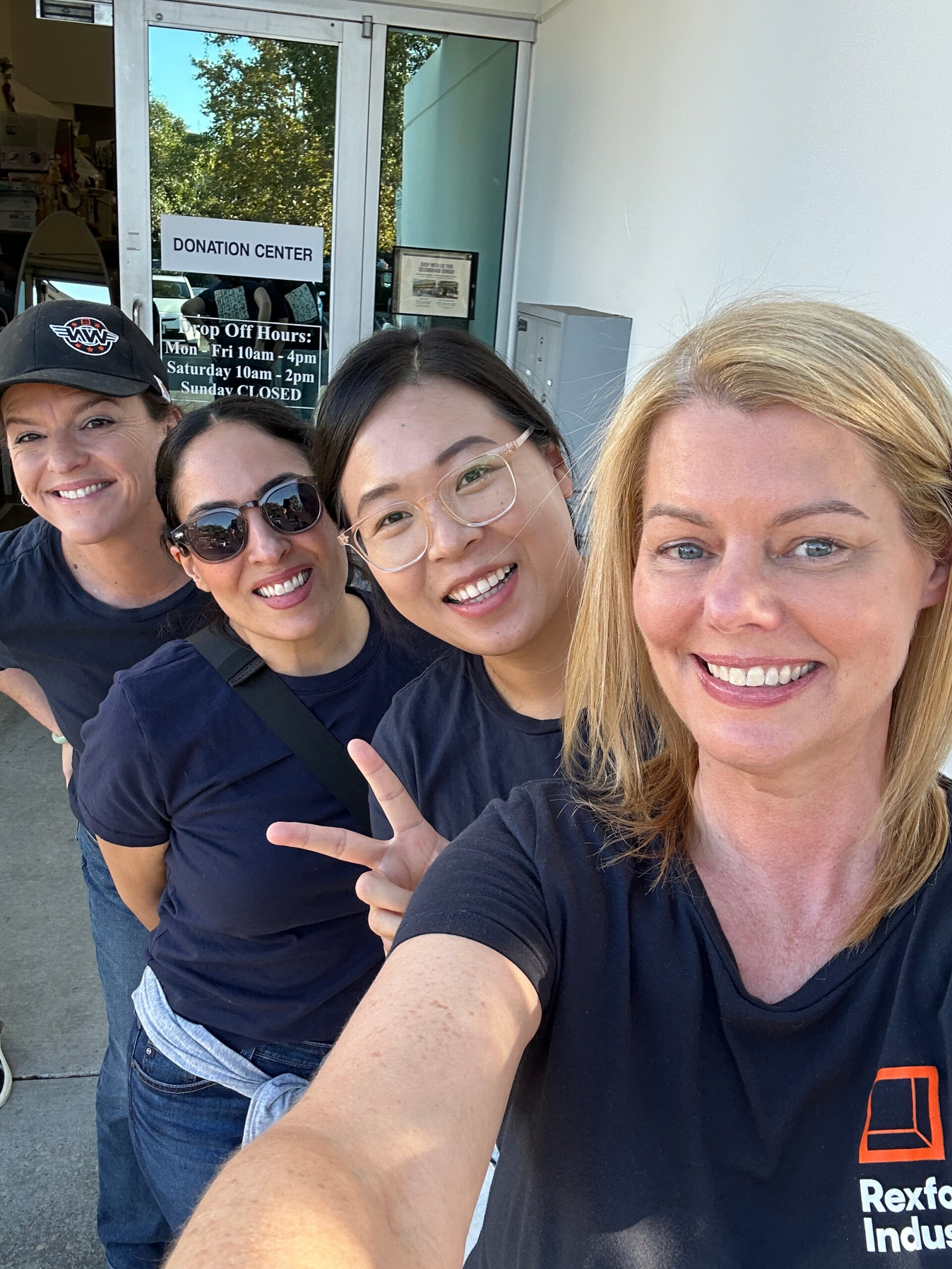 Group of Rexford employees at an outdoor volunteering event