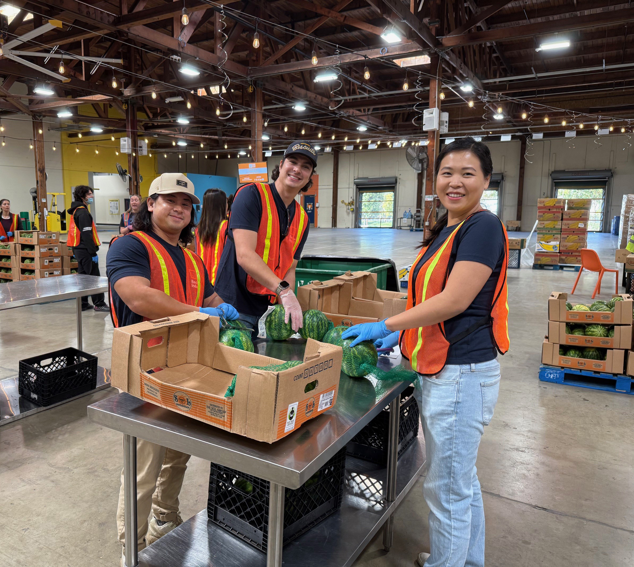 Group of Rexford employees at an indoor volunteering event