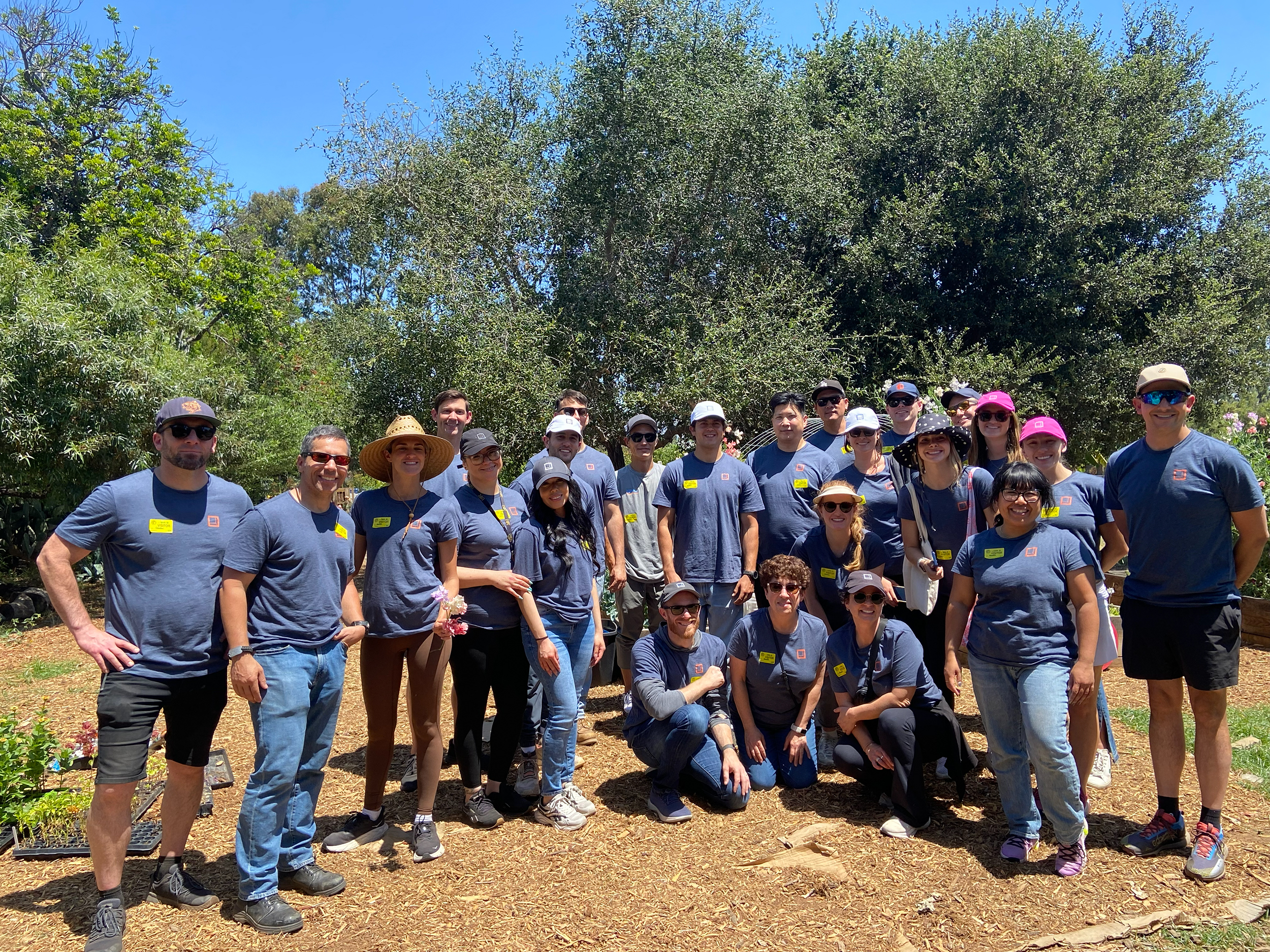 Group of Rexford employees volunteering outside