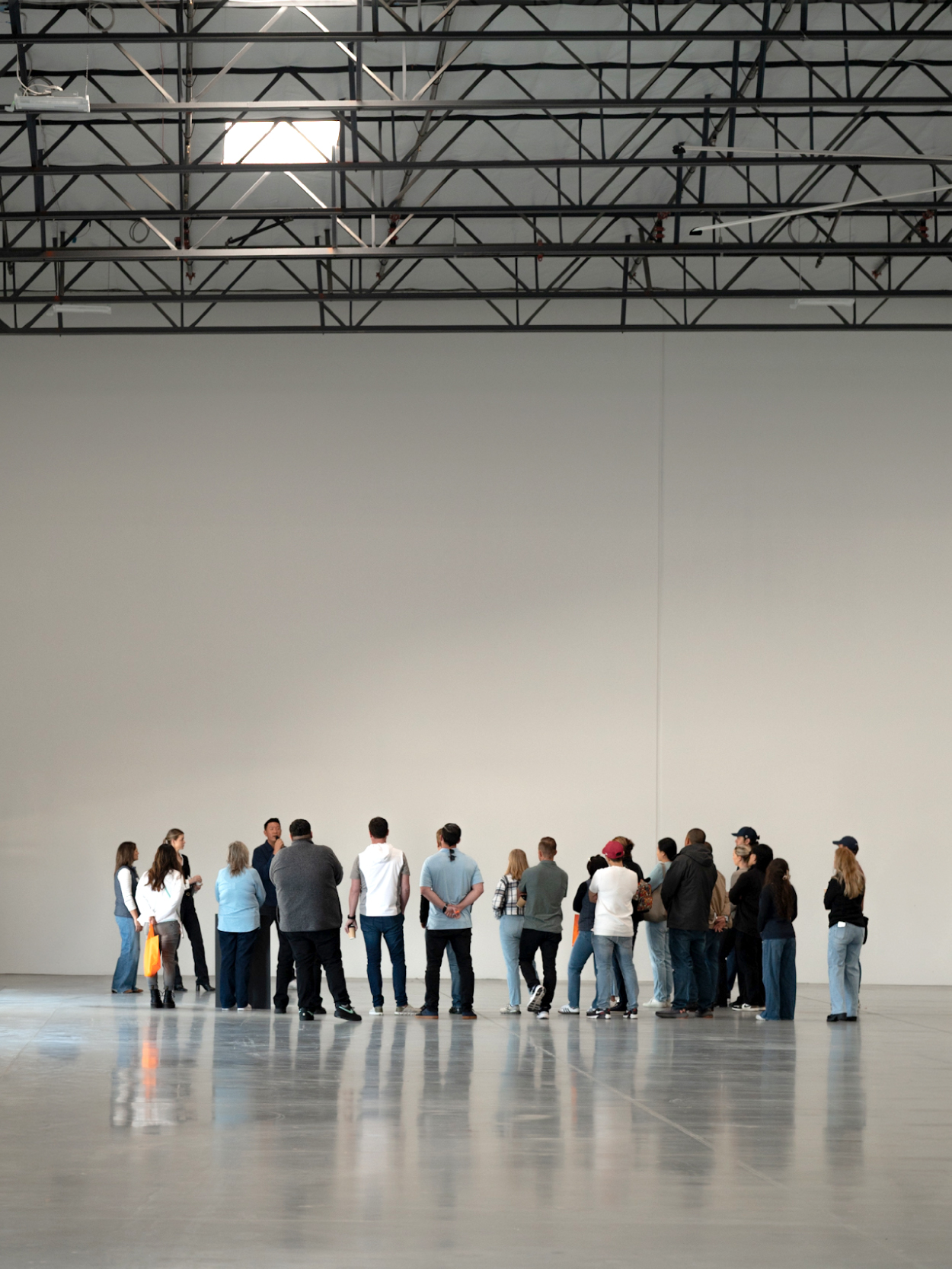 Rexford team gathered inside an industrial warehouse
