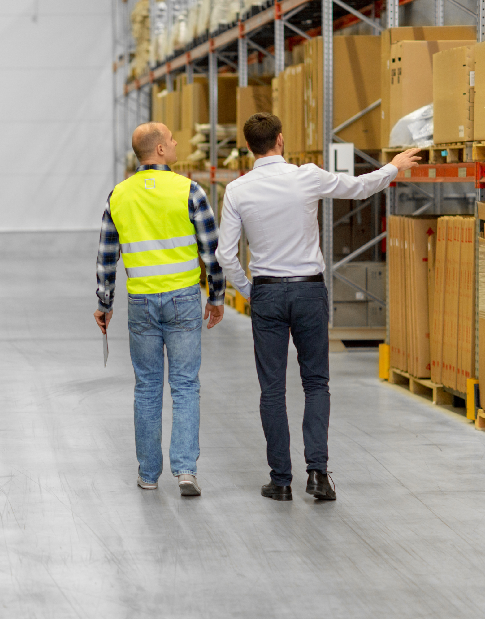 Workers in an industrial warehouse